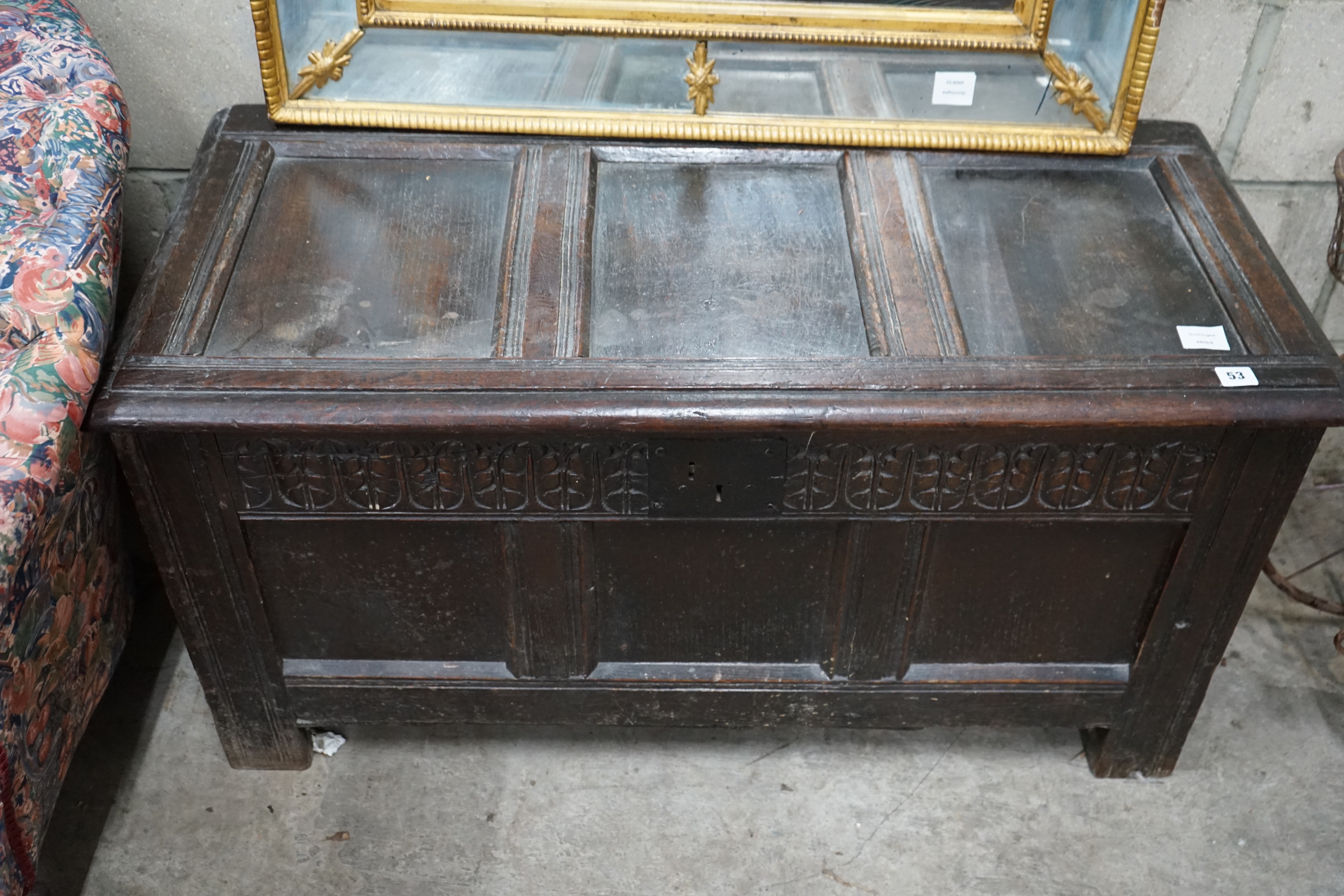 An 18th century oak coffer (re-lined), width 108cm depth 49cm height 56cm